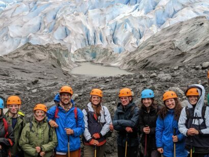 group in front of a glacier ready to ice climb