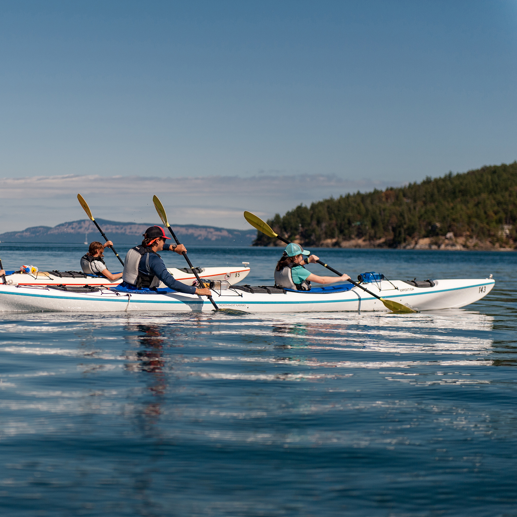 students sea kayaking in Washington