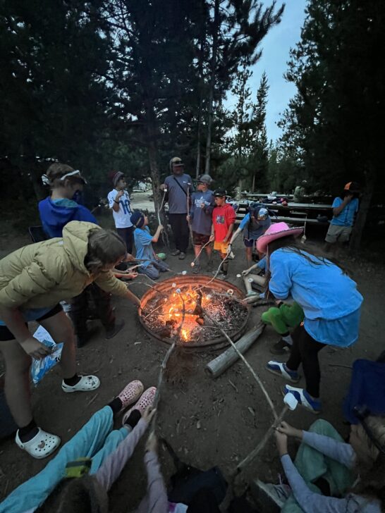 making smores at a campfire