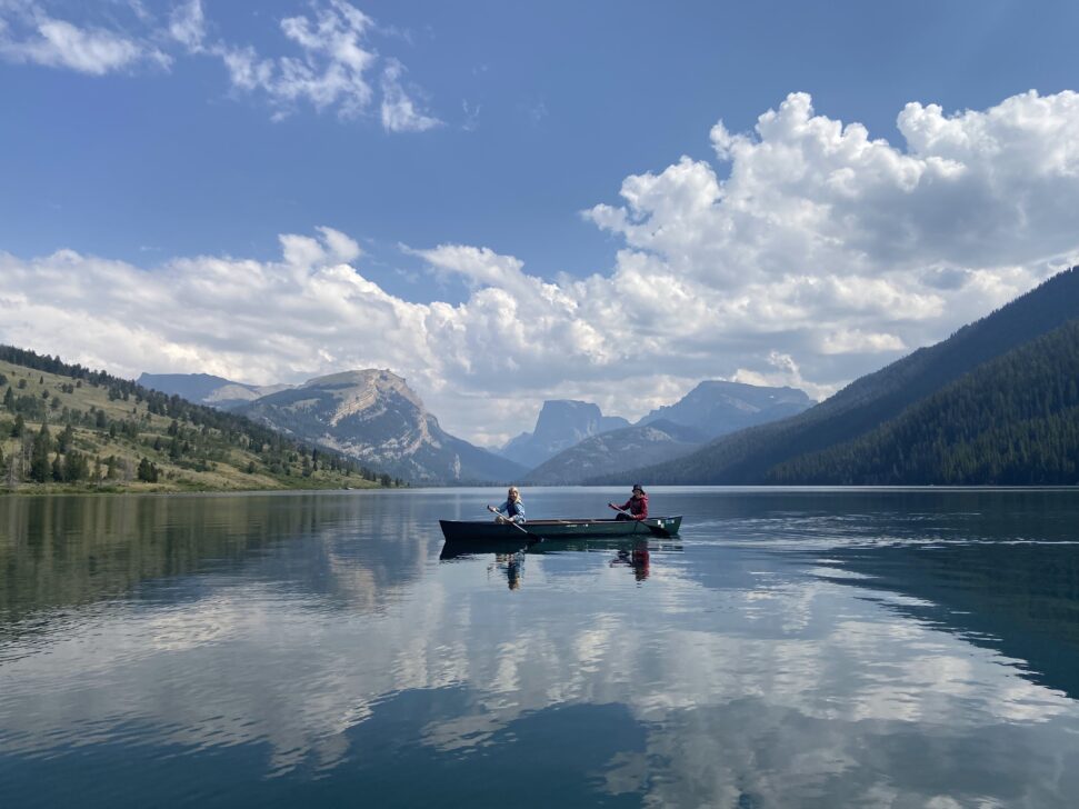 canoeing in a lake in wyoming