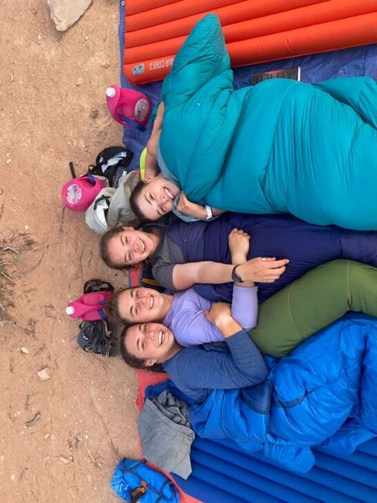 4 students in sleeping bags