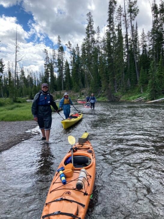 Portaging kayaks in Yellowstone National Park