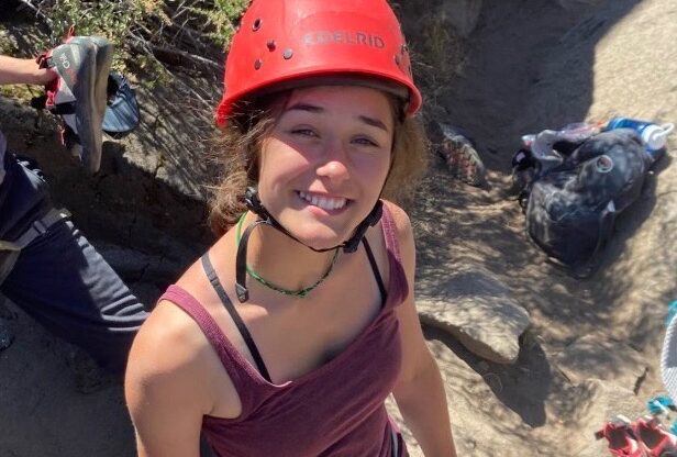 Girl with rock climbing helmet smiling
