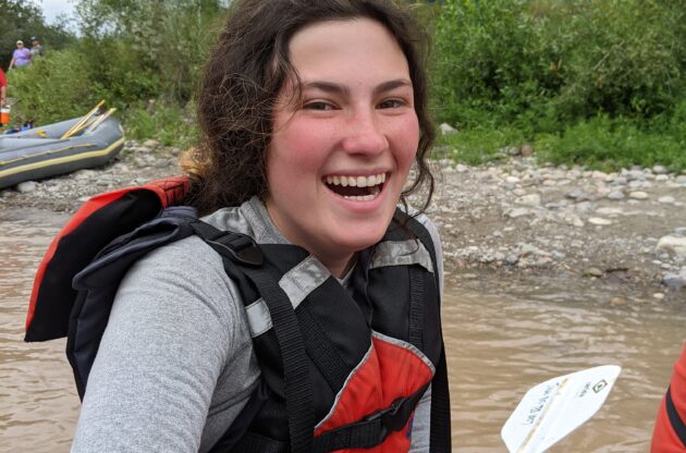 Girl Smiling on White Water Raft