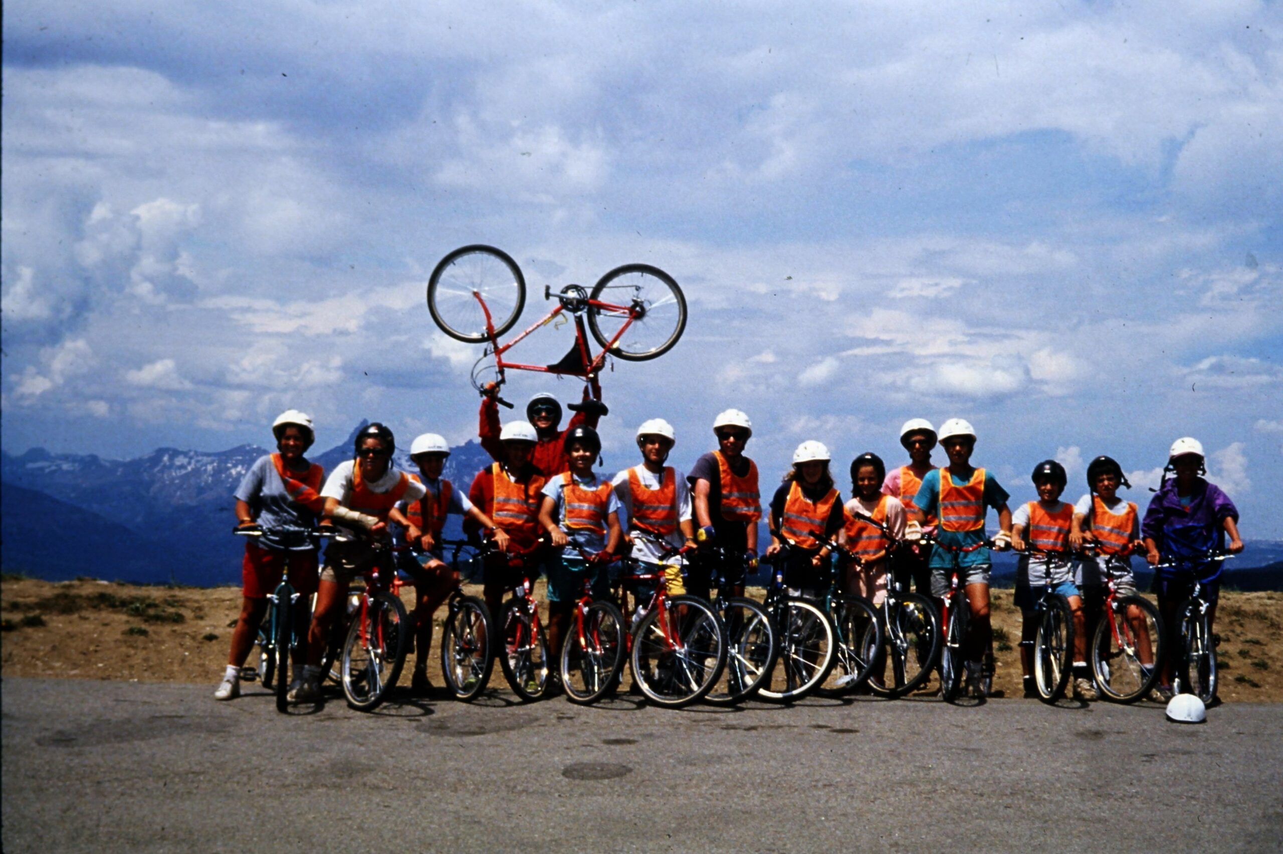 1991 Group Photo with person holding up a bike