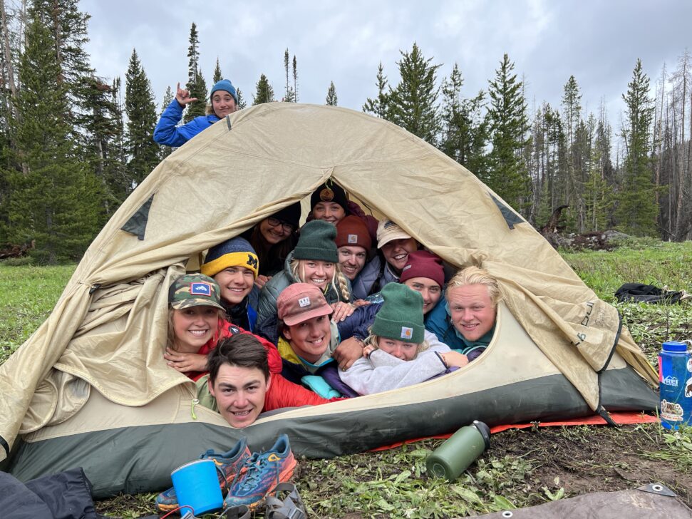 group of people in a tent