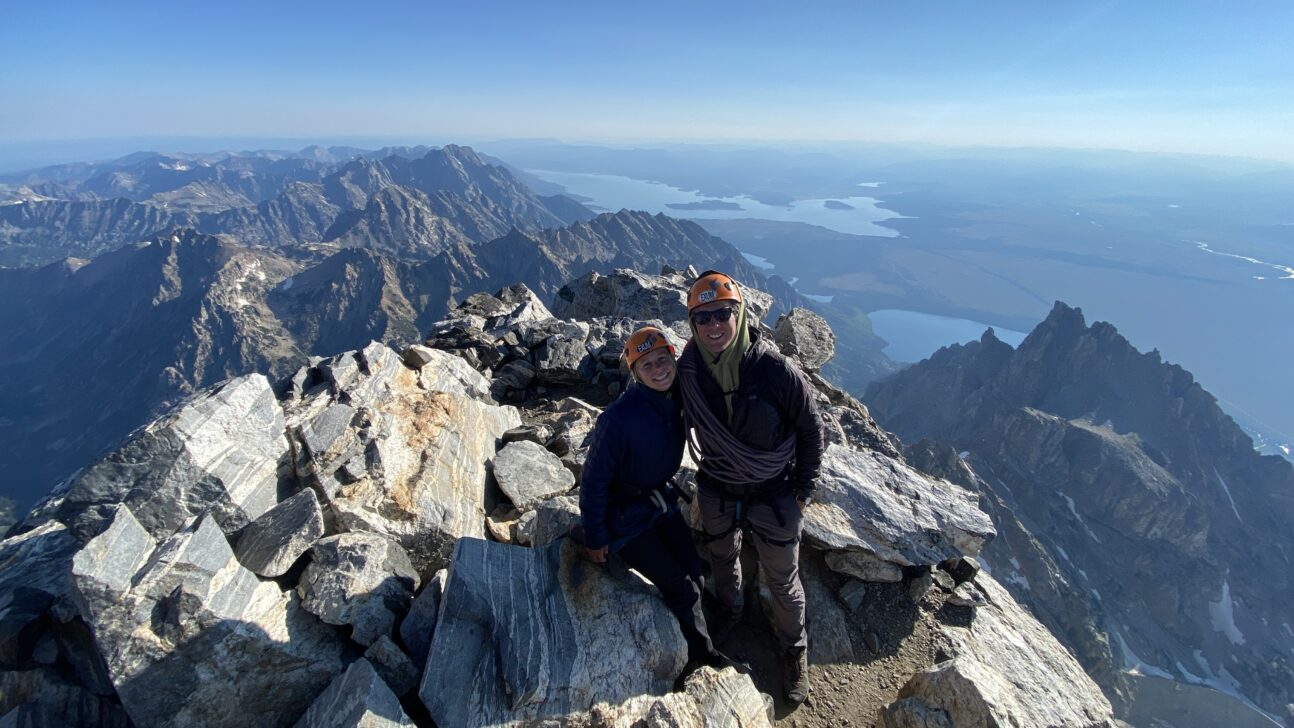 two people on the summit of Grand Teton