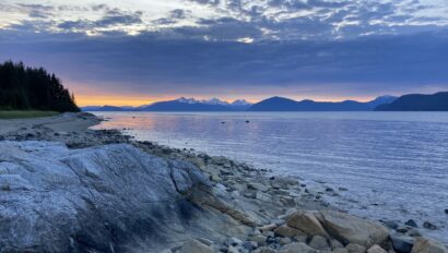 Colorful sunset over the shoreline of Alaska.